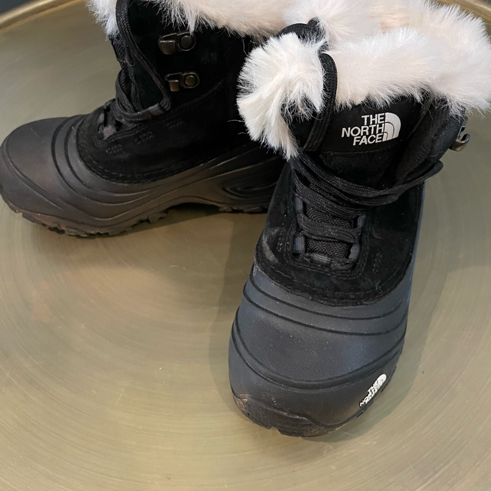 The North Face Black Boots with White Fur